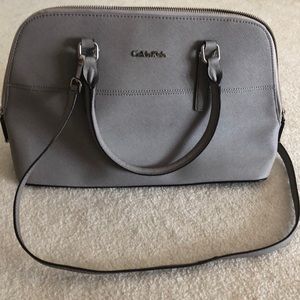Gray Calvin Klein handbag with silver hardware